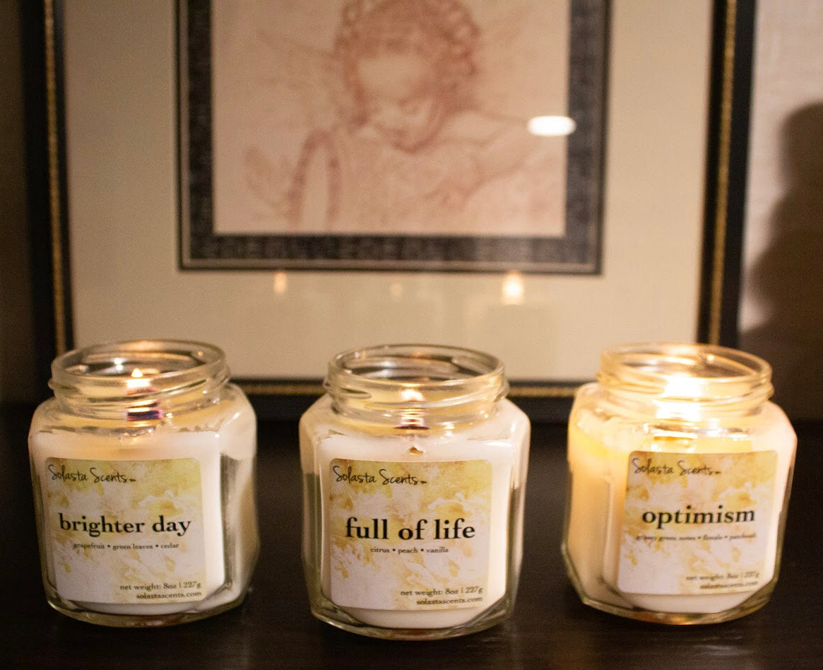 A couple of Solasta Scents® candles from the Level Up Collection.